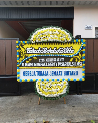Papan Bunga Duka di Singali